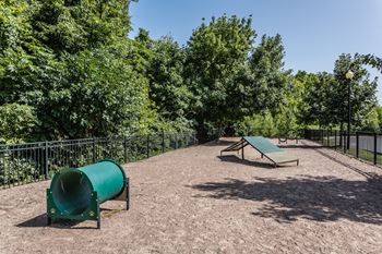 A park with a playground and a picnic table